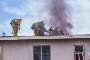 Firefighters on roof